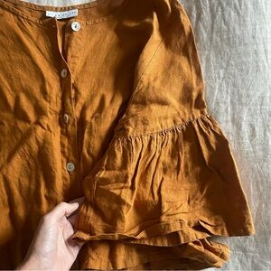 Bryn Walker linen pumpkin cropped blouse with buttons